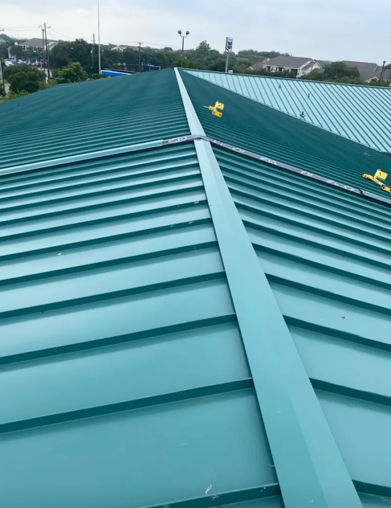 Green commercial metal roof ridge and valley for Metal Roof Repair in Centerton