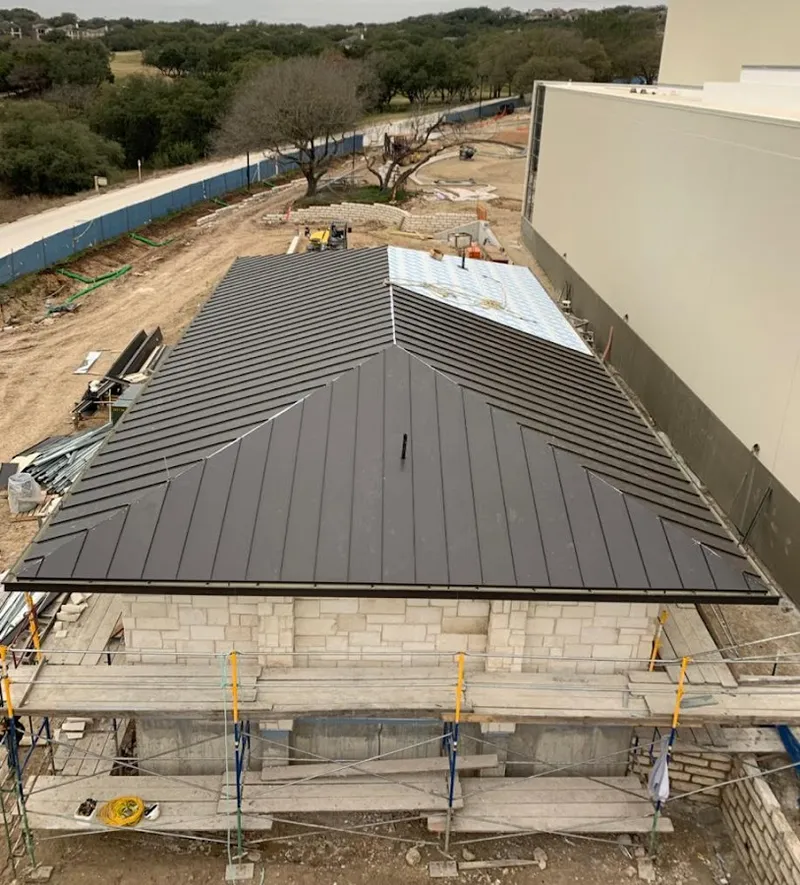 Metal roof new construction with scaffolding in Centerton