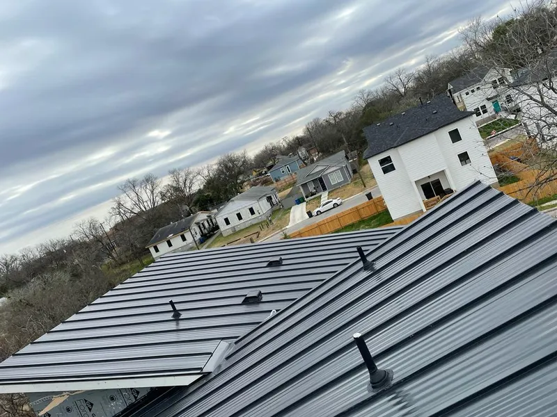 Standing seam metal roof panels with vents for Skylight Repair in Centerton